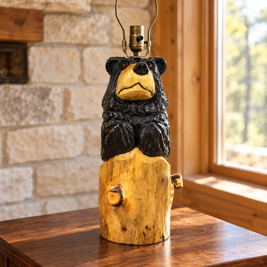Front view of a chainsaw-carved stump bear table lamp