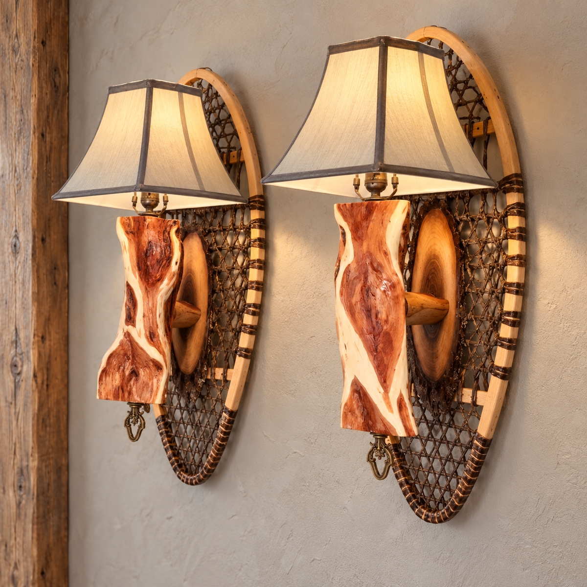 Coordinated pair of handcrafted snowshoe wall sconces
